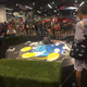 On Friday, artists painted a mural in near the Twitter Community Stage.